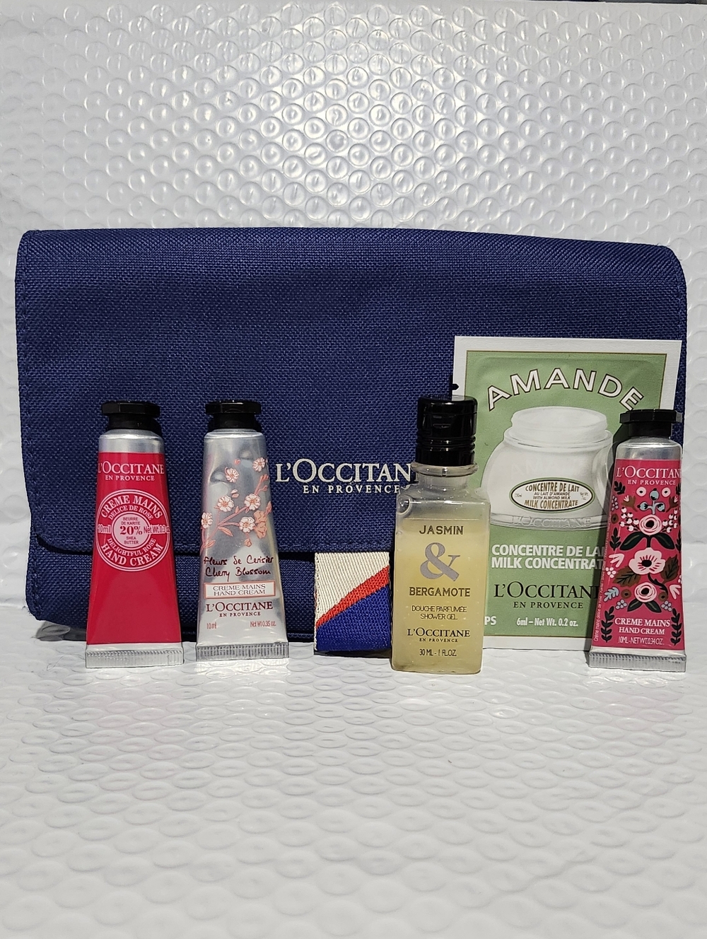 L'Occitane Travel Size Set - Cosmetic Bag with Hand Creams & Shower Gel